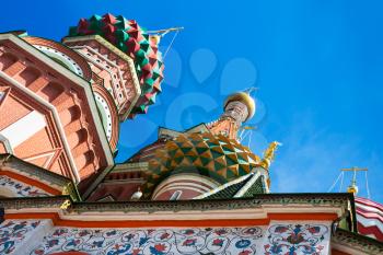 travel to Russia - bottom view of towers of saint Basil's Cathedral (Pokrovskiy Sobor) in Moscow city