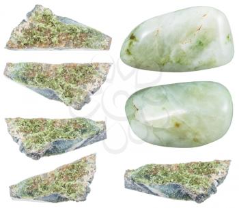 collection of tumbled and cristalline vesuvianite (idocrase, vesuvian) mineral stones isolated on white background