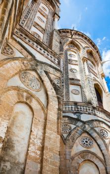travel to Italy - decorated towers of Norman cathedral Duomo di Monreale in Sicily