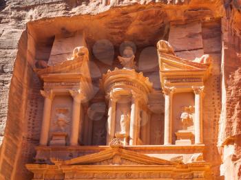 Travel to Middle East country Kingdom of Jordan - upper part of facade The Treasury (al-khazneh) temple in Petra town