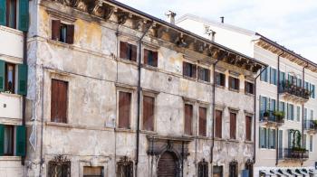 travel to Italy - facade of old urban houses in Verona city in spring