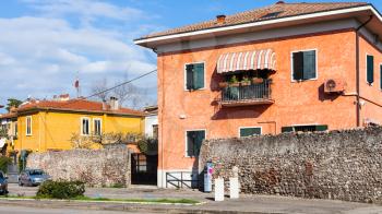travel to Italy - residential houses on street Via Pontida in Verona city in spring