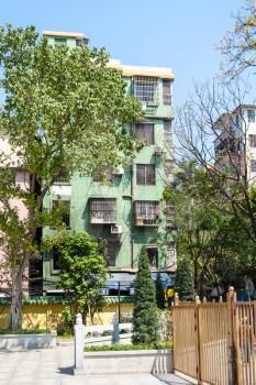 travel to China - small urban apartment house in Guangzhou city in spring season