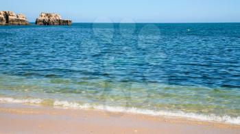 Travel to Algarve Portugal - beach Praia Maria Luisa near Albufeira city in sunny day