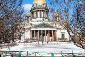 frozen garden near Saint Isaac's Cathedral on St Isaac Square in Saint Petersburg city in sunny spring day.