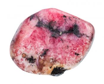 macro shooting of natural mineral stone - polished pink rhodonite gemstone from Ural mountains in Russia isolated on white background