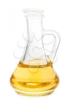 glass jug with vegetable oil isolated on white background
