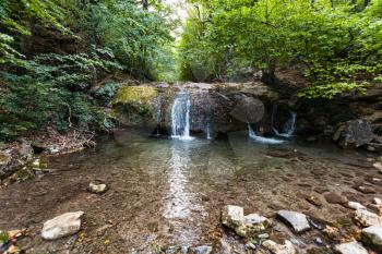 travel to Crimea - little waterfall on Ulu-Uzen river in Haphal Gorge of Habhal Hydrological Reserve natural park in Crimean Mountains in september
