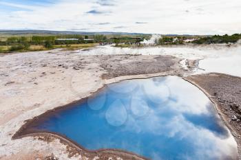 travel to Iceland - pool of The Geisyr (The Great Geysir) in Haukadalur valley in autumn