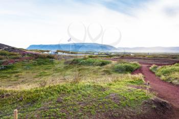 travel to Iceland - volcanic land and car parking near Kerid lake in september