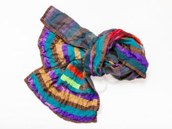 knotted stitched patchwork scarf from silk strips isolated on white background