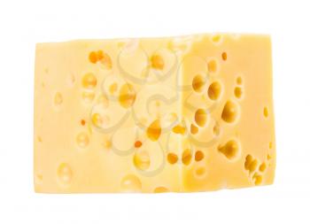 hunk of yellow medium-hard cow's milk swiss cheese with internal holes isolated on white background