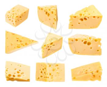 set from pieces of yellow medium-hard cow's milk swiss cheese with internal holes isolated on white background