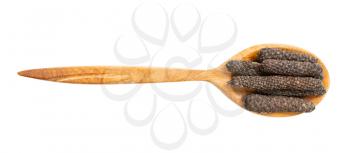 top view of wood spoon with java long peppers isolated on white background