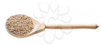 crushed rye groats in wooden spoon isolated on white background