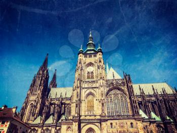 Vintage retro hipster style travel image of Gothic architecture facade of St. Vitus Catherdal, Prague, Czech Republic with grunge texture overlaid