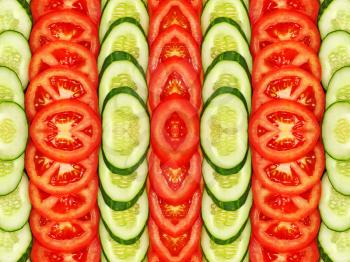 Sliced tomatoes and cucumbers suitable as symmetrical background.