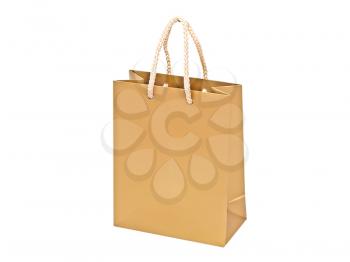 Golden gift bag isolated on white background.