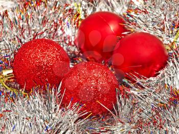 Red christmas balls and silver decoration. 
