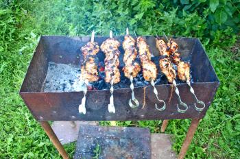 Appetizing  juice shashlik is preparated on barbecue.