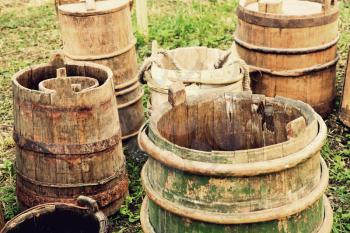 Old wooden buckets and barrels.Toned image.