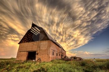 Storm Clouds Saskatchewan antique car and barn