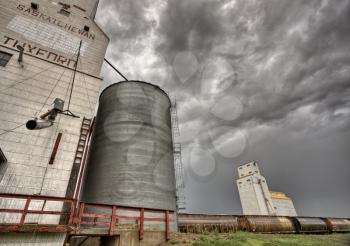 Prairie Grain Elevator in Saskatchewan Canada with storm clouds