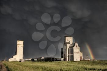 Prairie Grain Elevator in Saskatchewan Canada with storm clouds