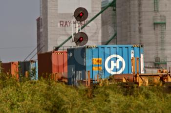 Container rail cars passing through Raymore Saskatchewan