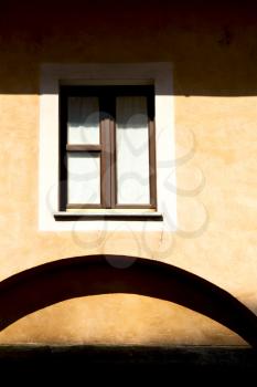 shutter europe  italy  lombardy       in  the milano old   window closed brick      abstract grate