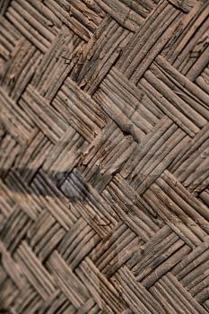 a wall build on wicker bamboo like abstract vintage surface