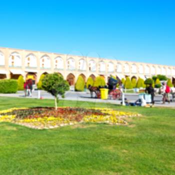 blur in iran   the old square of isfahan prople garden tree heritage tourism and mosque
