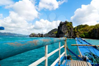 blur  in  philippines   view of the island hill from the prow of a boat