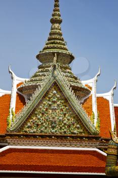 asia  bangkok in   temple  thailand abstract cross colors roof  wat    sky   and    colors religion mosaic  sunny

