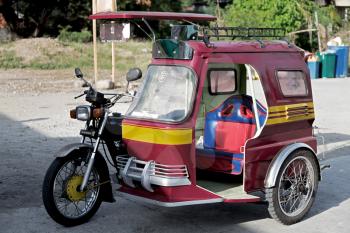 in asia philipphines the typical tuk tuk motorbike for tourist