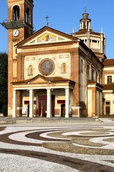 in  the parabiago old   church  closed brick tower sidewalk italy  lombardy  