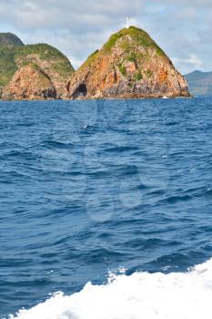 blur  in  philippines   a view from  boat  and the pacific ocean  mountain background