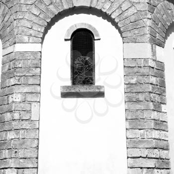 antique contruction in italy europe marble and rose window the wall