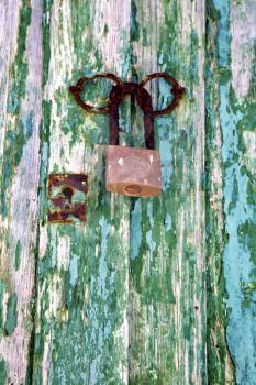 padlock spain   brass knocker lanzarote abstract door wood in the green 
