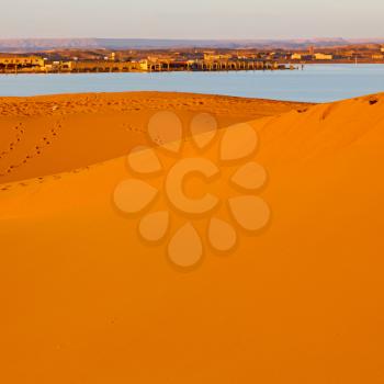 sunshine in the desert of morocco sand and  lake   dune