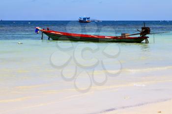 asia in the  kho tao bay isle white  beach    rocks house boat in thailand  and south china sea 
