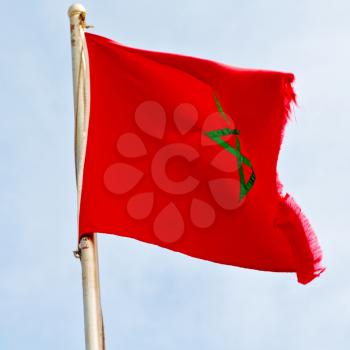 waving flag in the blue sky tunisia  colour and wave