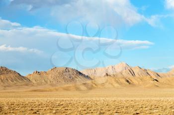 in iran blur mountain and landscape from the window of a car