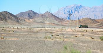 in iran blur mountain and landscape from the window  of a car