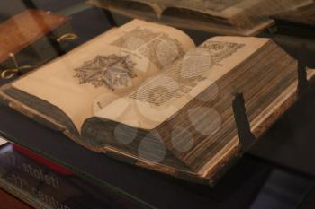 PRAGUE - JUNE 23, 2013: Old book at exhibition in Czech National Museum