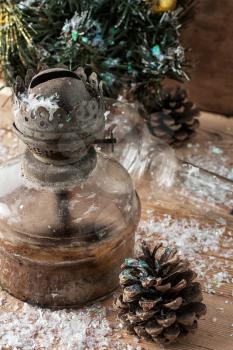 Christmas decoration with an oil lamp in retro style.