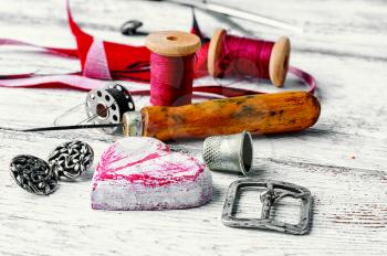 Sewing tool for needlework and leather scraps
