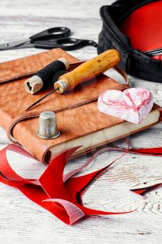 crafts with leather and tools for sewing