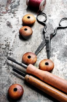 Wood beads jewelry and tool for making iron on vintage background