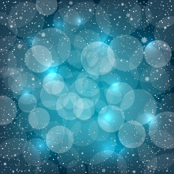 Blue bokeh snow background with sparkle circles. Christmas and New Year backdrop